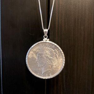 Silver Peace Dollar in Sterling Silver Bezel